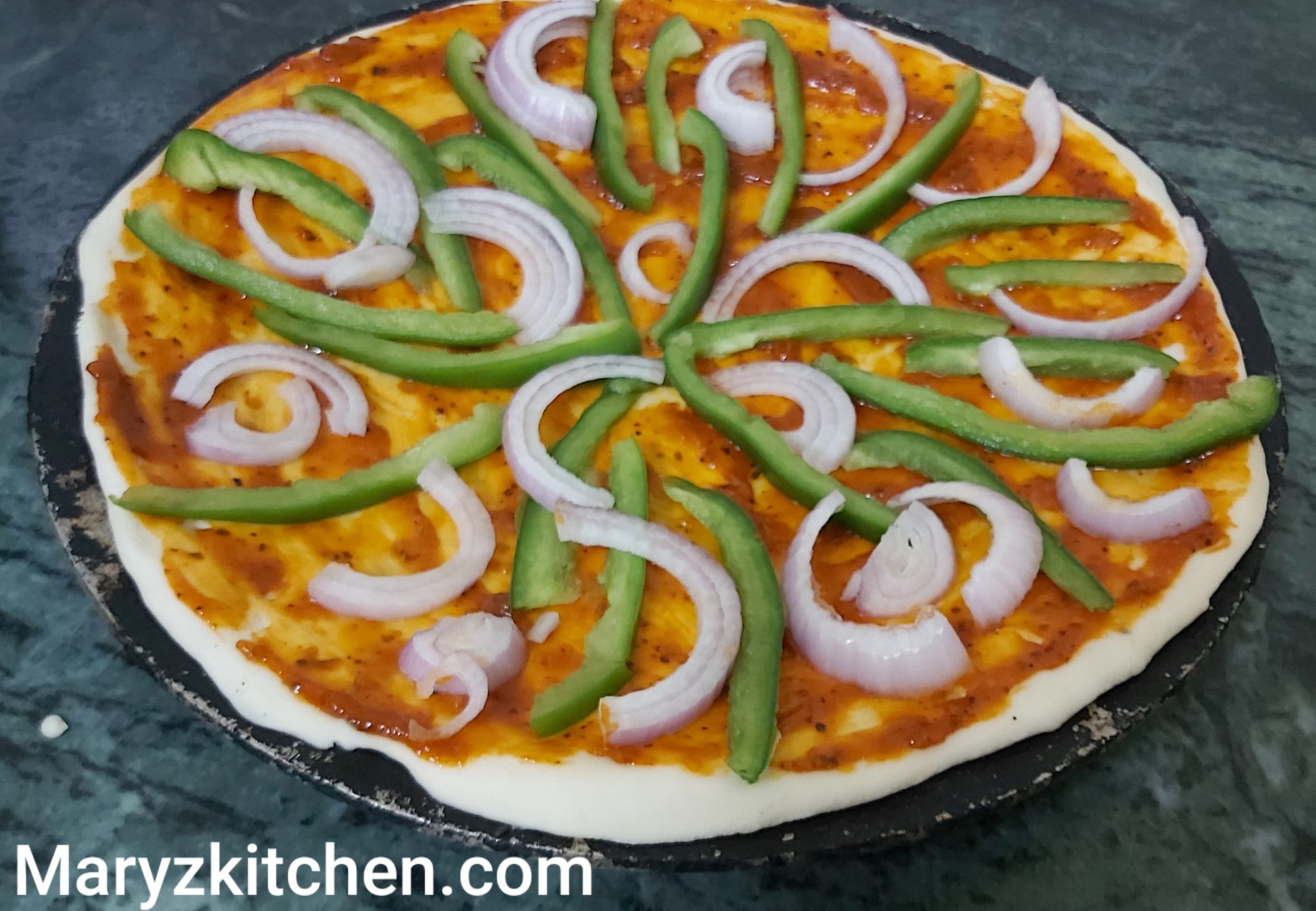 Thin crust tava pizza Mary's Kitchen